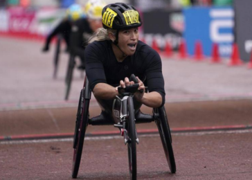 Madison de Rozario smiles in triumph after winning the 2023 London Marathon (Women's Wheelchair)