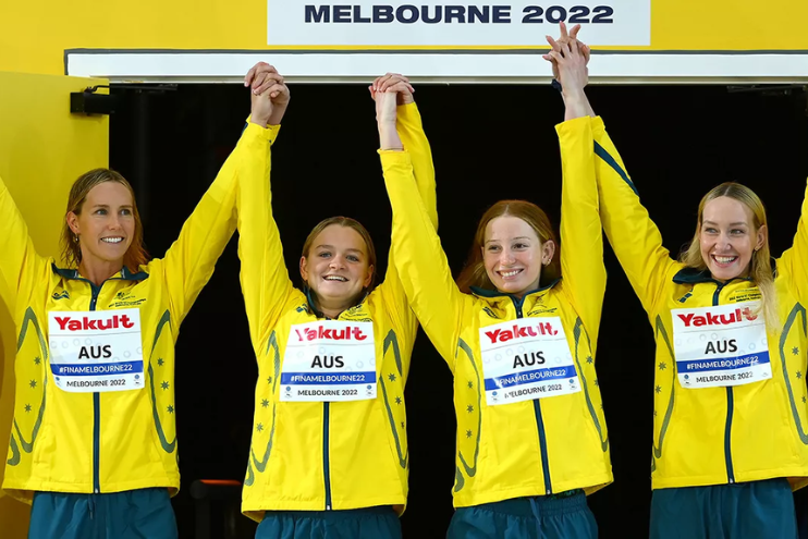 Silver medallists Kaylee McKeown, Jenna Strauch, Emma McKeon and Meg Harris of Australia celebrate during the medal ceremony for the Women's 4x100m Medley Relay Final.